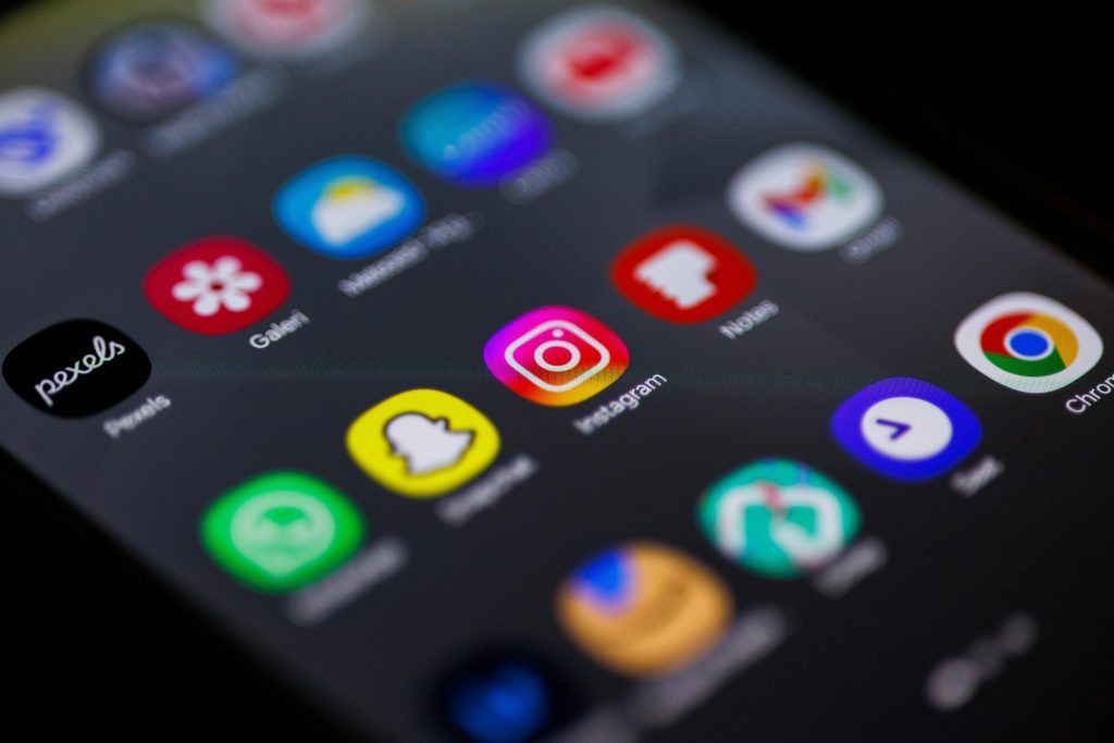 Android smartphone screen displaying popular social media apps icons